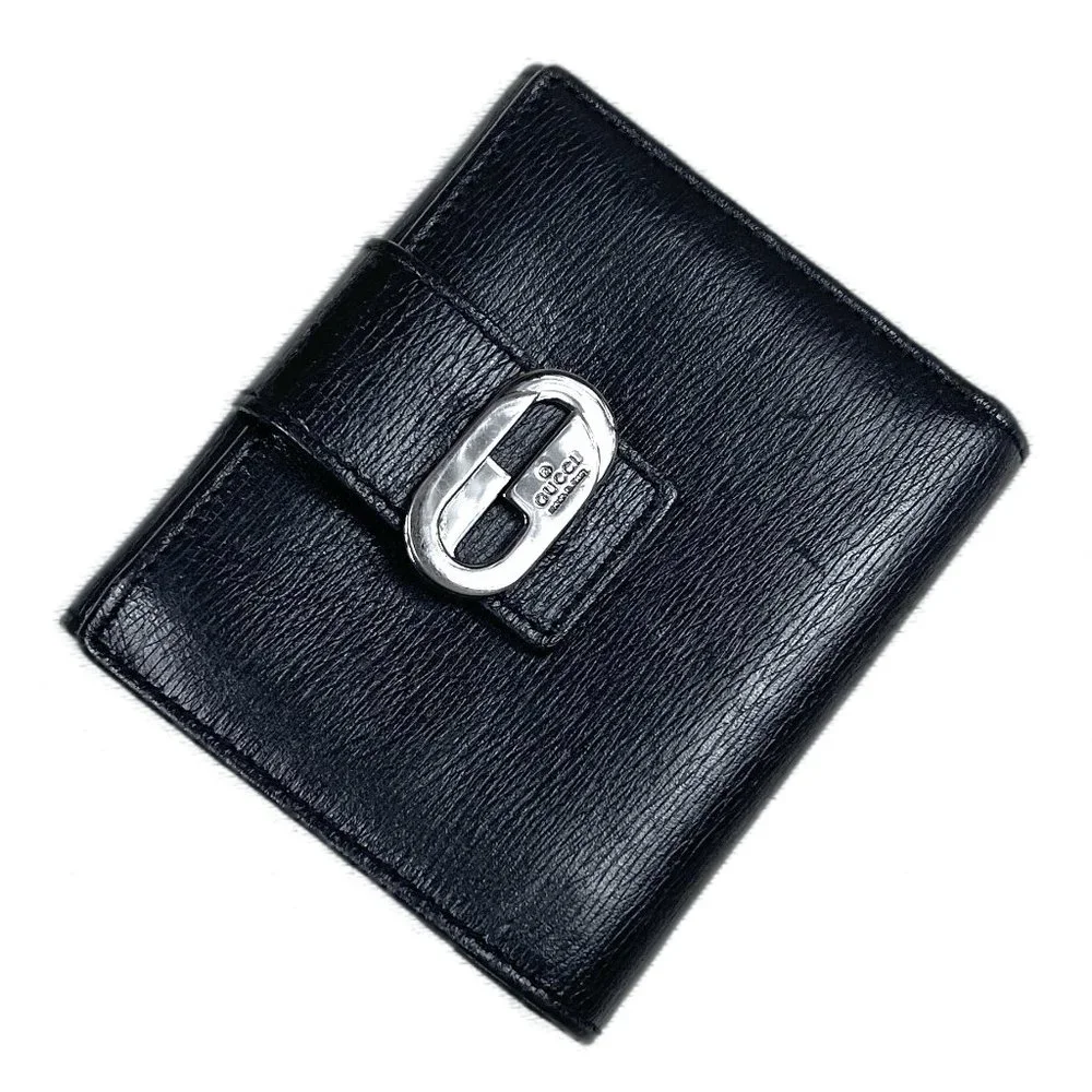 Auc Gucci Snappy Bi-fold GG vintage leather wallet